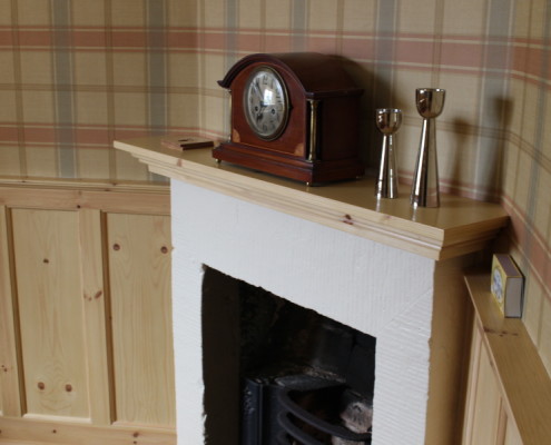 mantlepiece and matching wall panelling