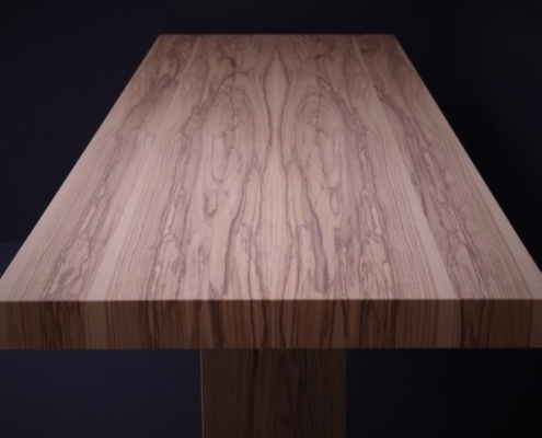 Flows dining table in Olive Ash